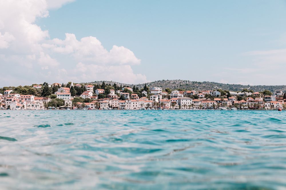 On a Trip to Croatia, We Rent a Paddle Boat and Go Swimming